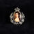 Small brooch with picture of Queen Elizabeth